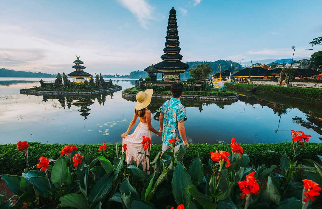 Couple at Ulun Datu Bratan Temple in Bali, Indonesia