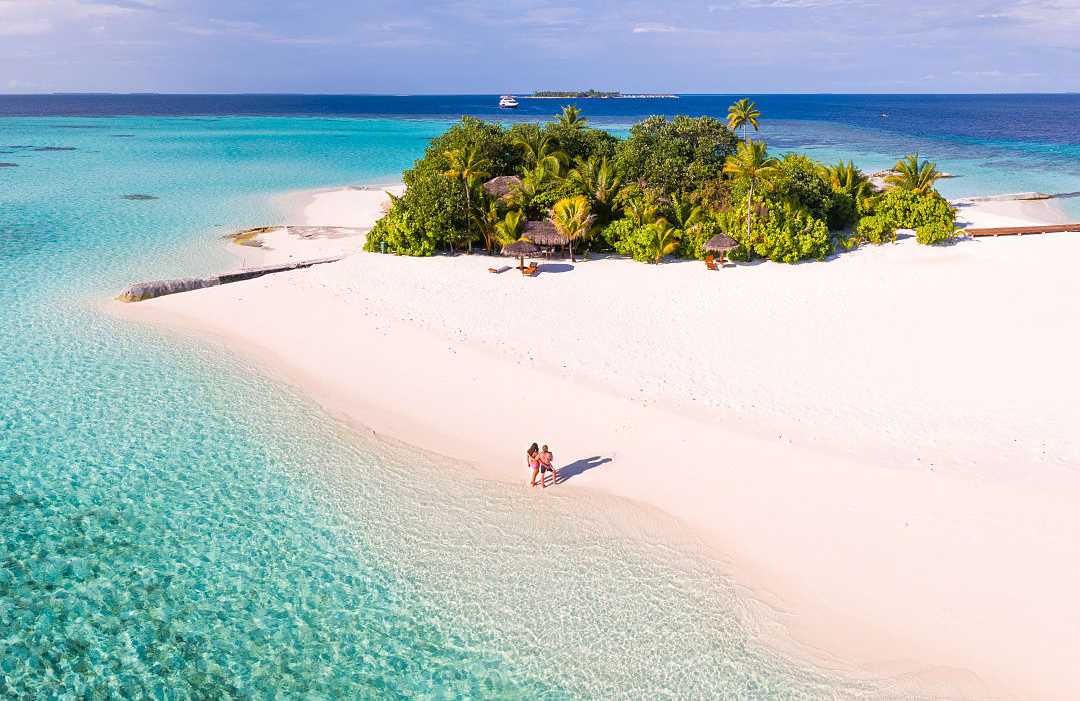 Couple on the beach in the Maldives