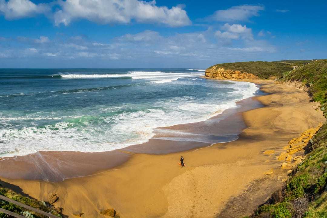 Surfer at Bells Beach in Victoria, Australia