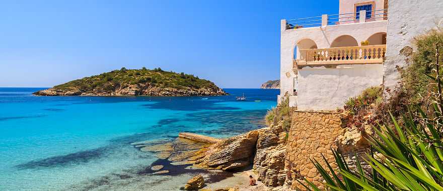 Traditional villa overlooks the ocean in Majorca.