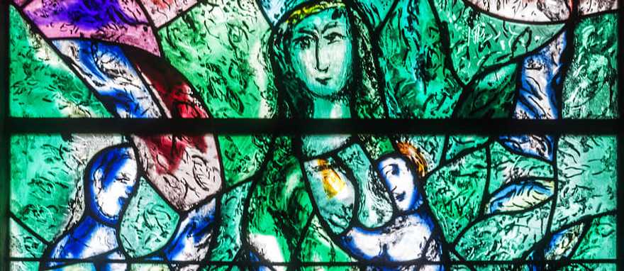 Stained Glass in Zürich's Fraumünster Church designed by Marc Chagall Details of the Mach Chagall designed stained glass windows in the the Fraumünster Church in Zürich, Switzerland