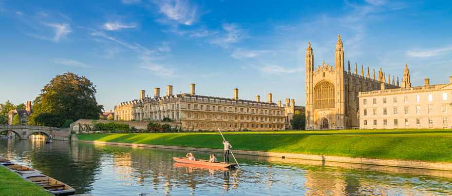 Couple punting on Cam River in Cambridge, England