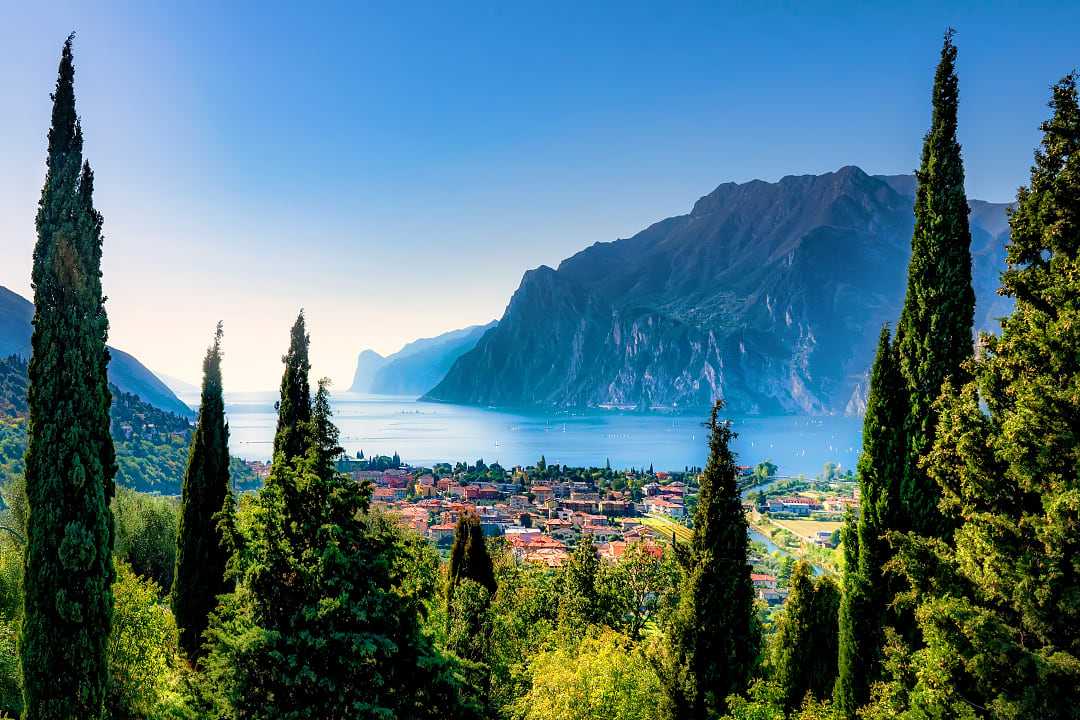 View of Lake Grade and mountains in Torbelo, Italy