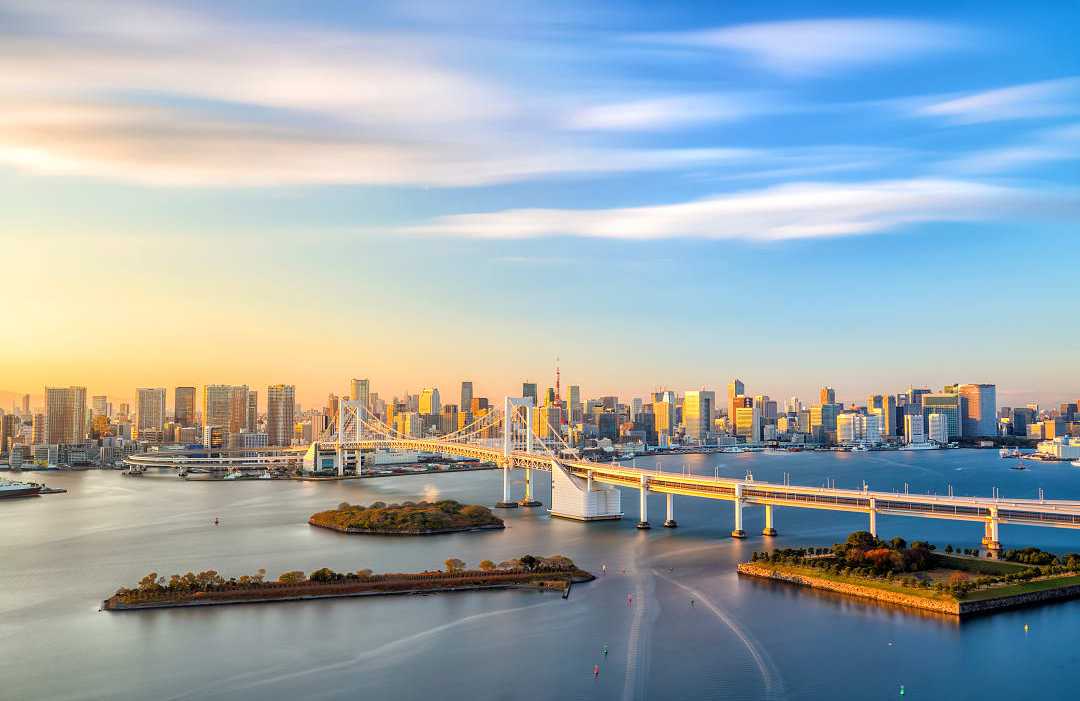 Tokyo skyline with Tokyo tower and rainbow bridge in Japan