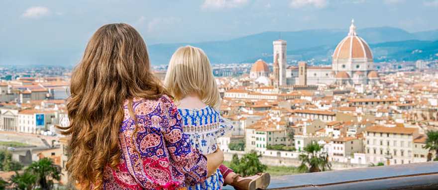 Mom and daughter admire the view of Florence from Piazzale Michelangelo Mom and daughter admire the view of Florence from Piazzale Michelangelo