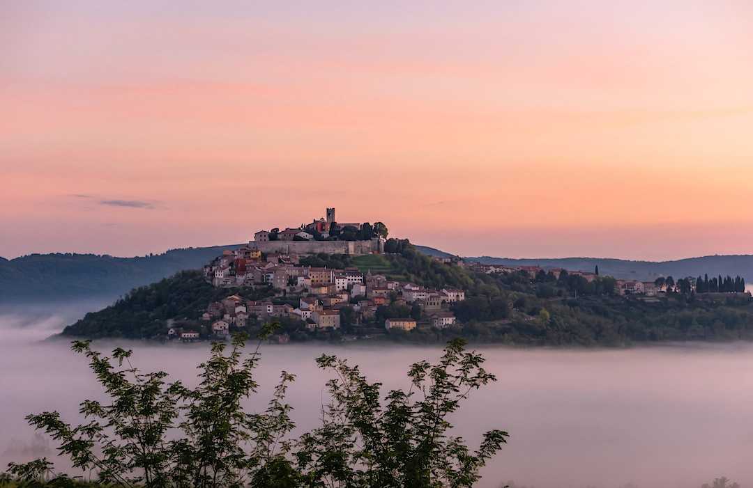 Motuvun, Croatia Foggy sunrise in Motuvun, Croatia