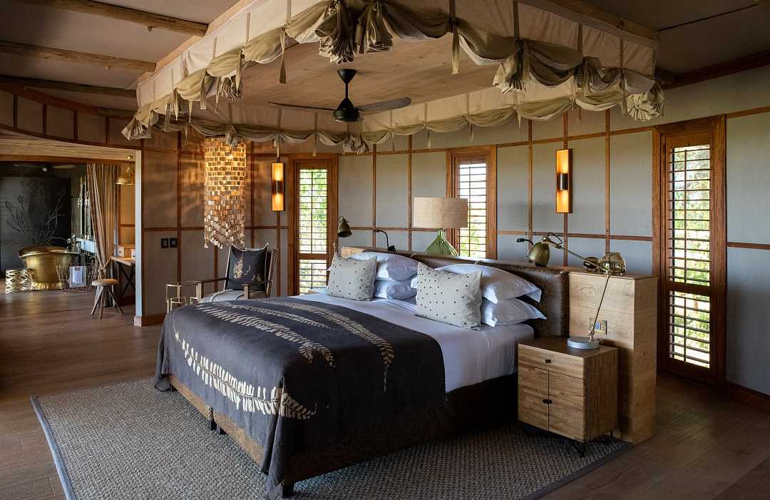 Luxurious bedroom suite at Mombo Camp in the Okavango Delta, Botswana