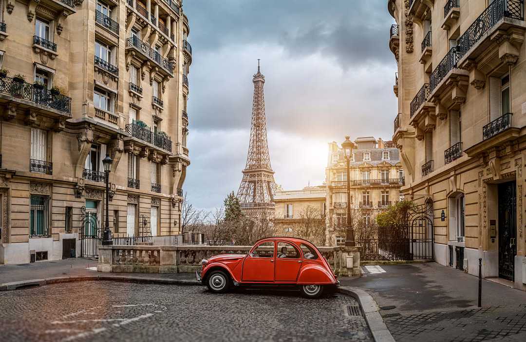 Paris, France Small Paris street with view of the famous Eiffel Tower