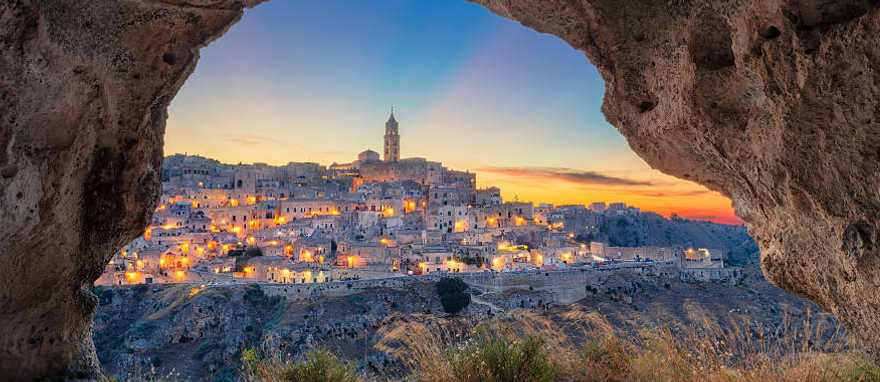 Medieval city of Matera in Southern Italy during a sunset Medieval city of Matera in Southern Italy during a sunset