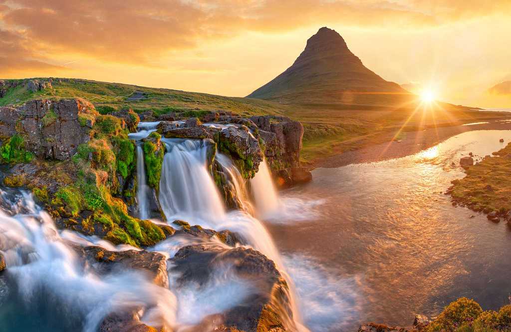 Kirkjufellsfoss and Mt Kirkjufell in Iceland Kirkjufellsfoss and Mt Kirkjufell in Iceland