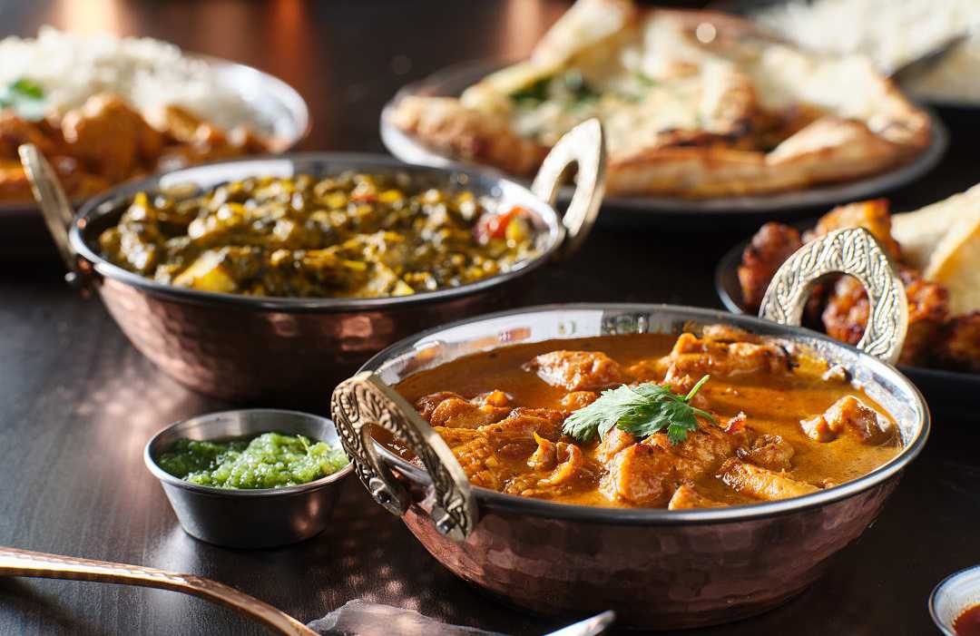 Chicken tikka masala in a creamy tomato curry, served at a restaurant in Agra.