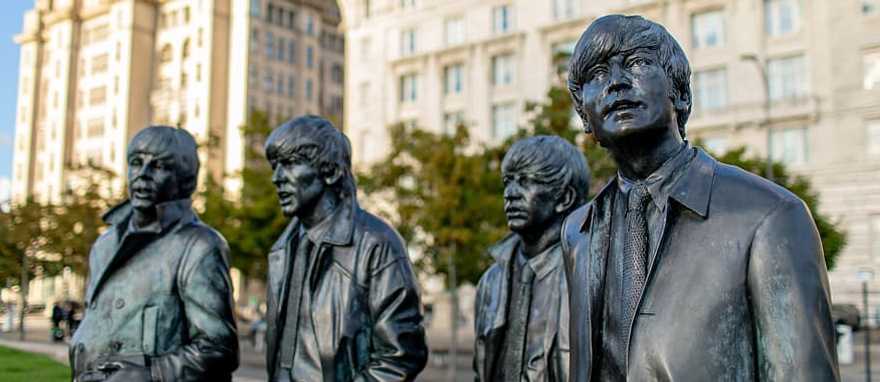 The Beatles Statues in Liverpool, UK. Photo courtesy of: Visit Liverpool Lifelike bronze statues of The Beatles on Liverpool’s waterfront promenade.