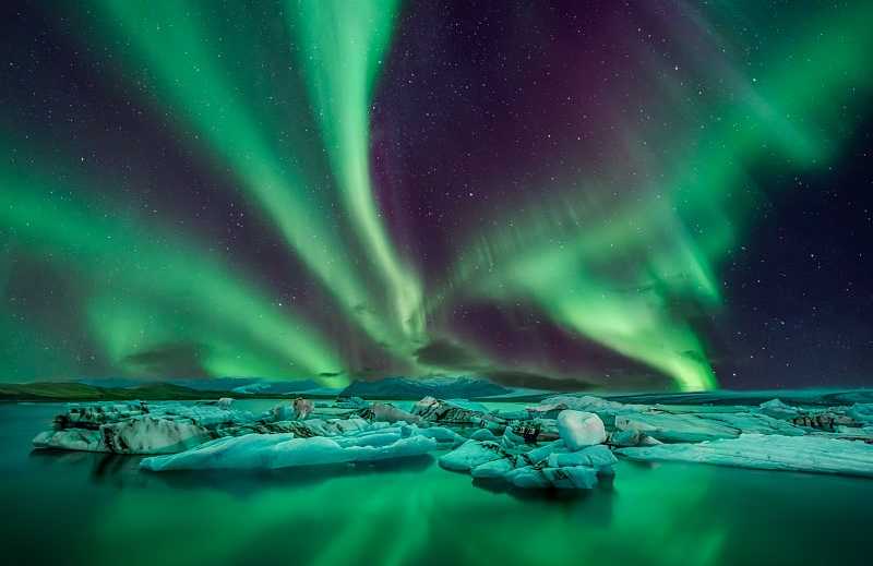 Northern lights over Jakulsarlon Glacier Lagoon in Iceland Northern lights over Jakulsarlon Glacier Lagoon in Iceland