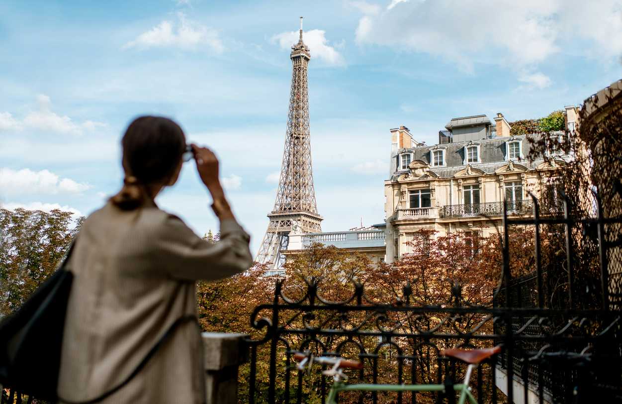 Woman admiring the Eiffel Tower, Paris. Woman admiring the Eiffel Tower, Paris.