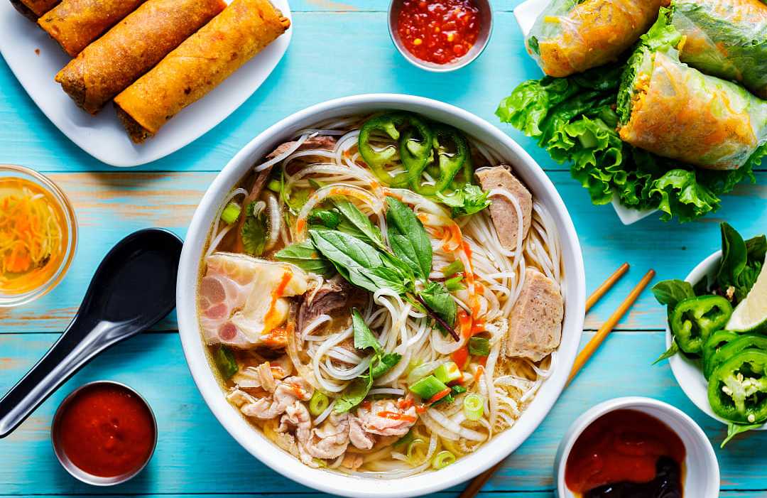 Vietnamese Cuisine Vietnamese Pho bo with beef and spring rolls