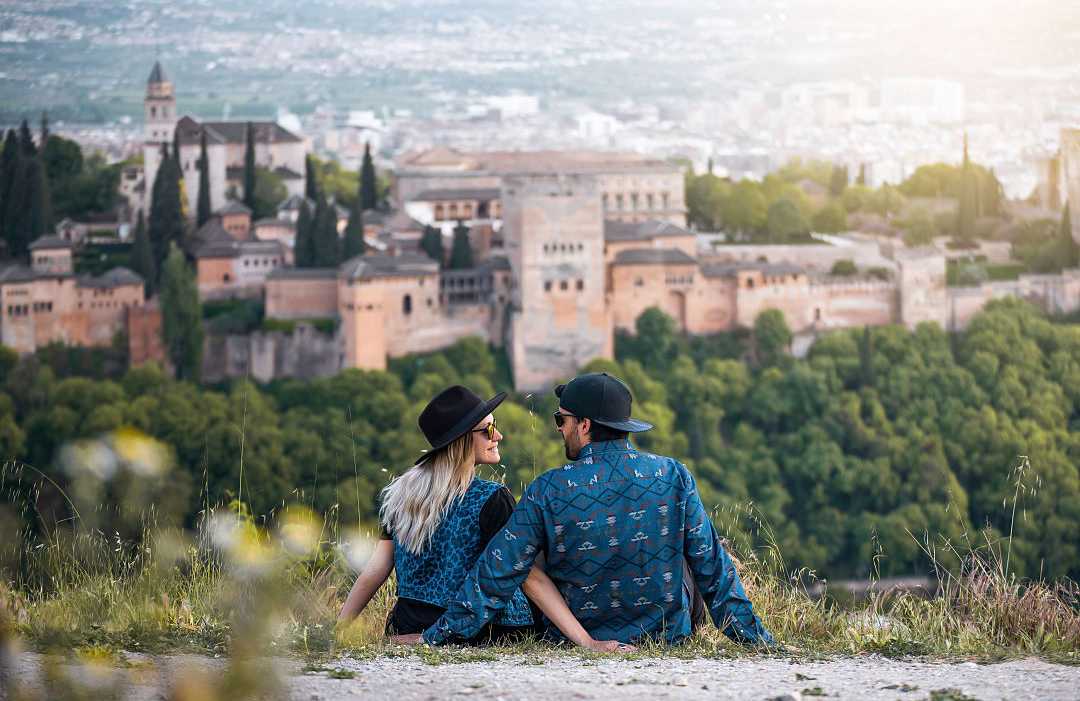 The Alhambra in Granada, Spain Couple at the Alhambra in Granada, Spain