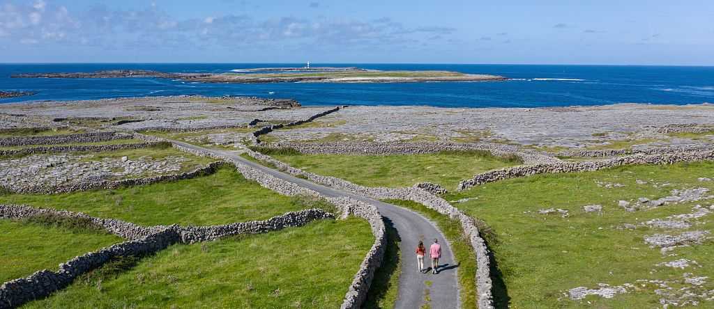 Couple walking on Inishmore, Aran Islands, County Galway