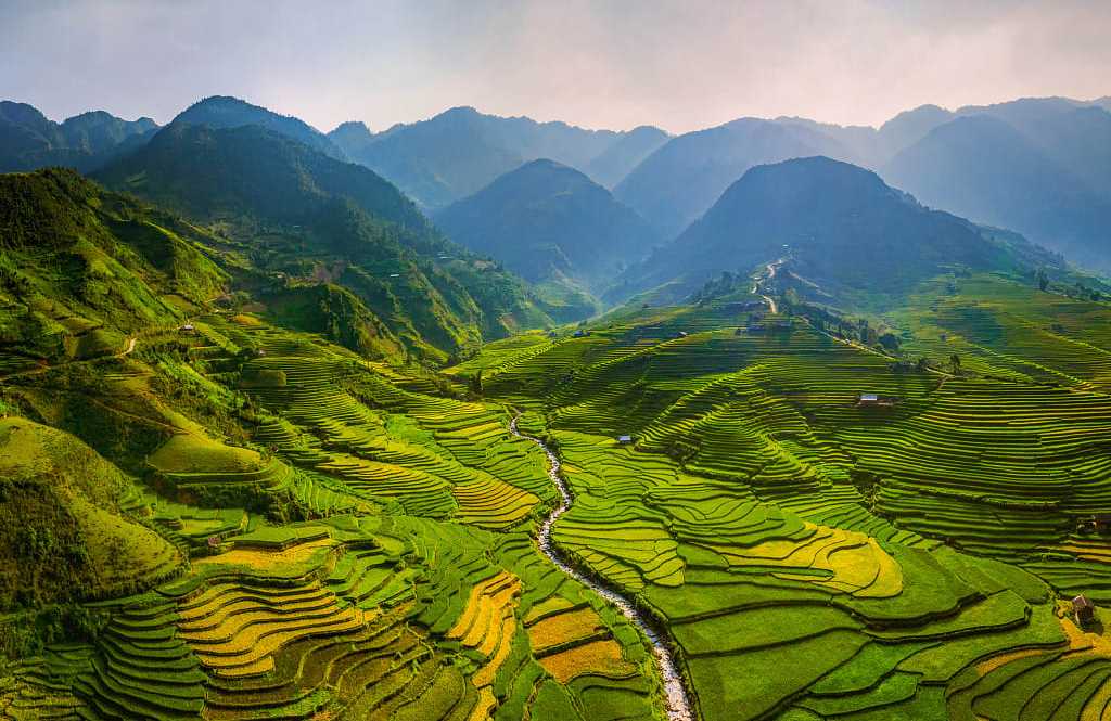 Rice terraces in mountainous countryside of Mu Cang Chai in the Yen Bai Province of Vietnam