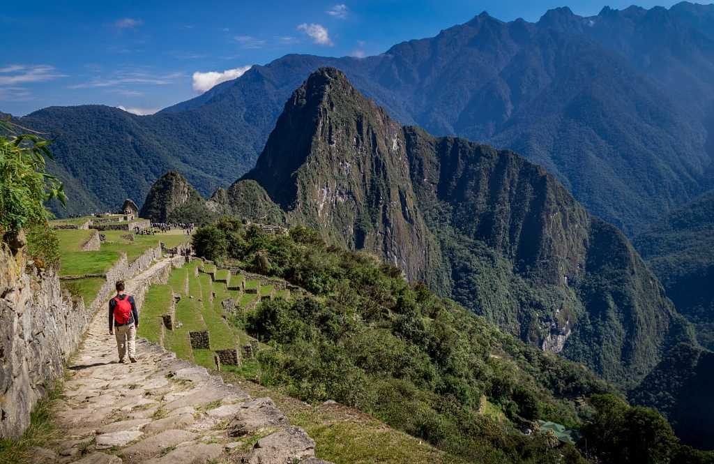 Inca Trail into Machu Picchu, Peru Man walking the Inca Trail into Machu Picchu, Peru