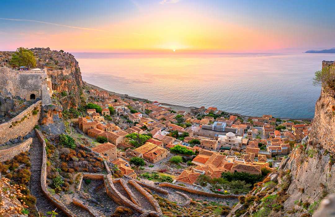 Parorama of old medieval castle town of Monemvasia at sunrise in Peloponnese, Greec