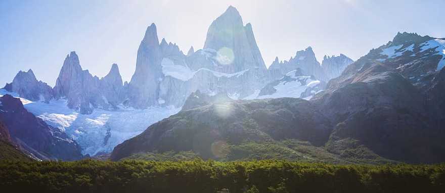 Woman hiking under Fitz Roy in Los Glaciares National Park in Patagonia, Argentina
