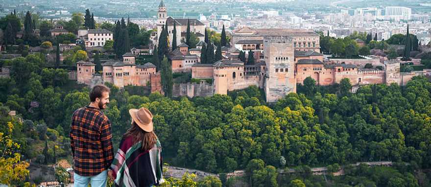 Couple overlooking the Alhambra in Granada, Spain