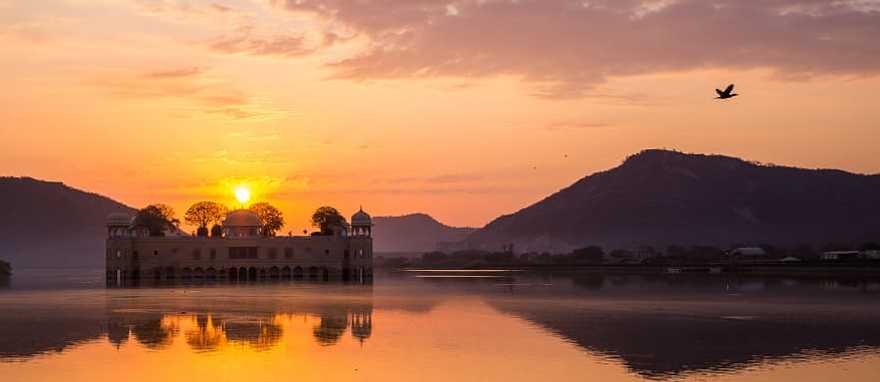 Romantic sunset over Jal Mahal on Man Sagar lake in Jaipur, India