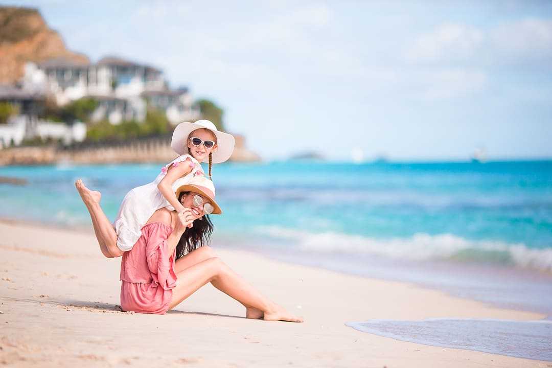 Mother and daughter on the beach in Zanzibar, Tanzania