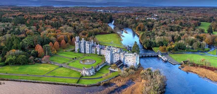 Aerial view of luxury Ashford castle and gardens in County Mayo, Ireland Aerial view of luxury Ashford castle and gardens in County Mayo, Ireland
