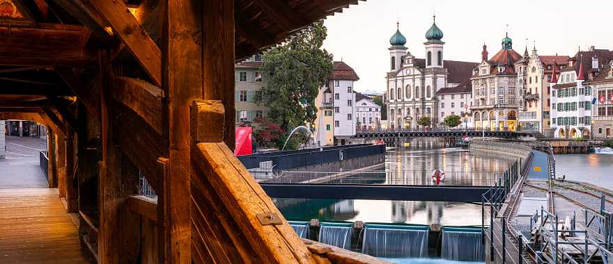 Jesuitenkirche (church right) taken from inside the Spreuerbrücke in Lucerne, Switzerland.