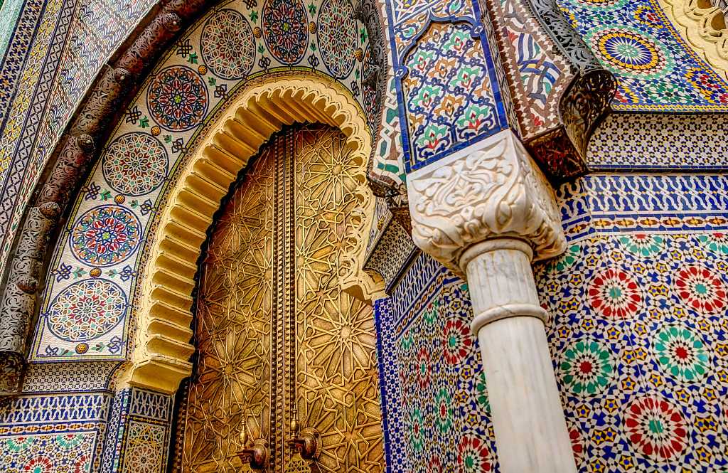 Intricate tile patterns, metal work and plaster carvings in Fez, Morocco