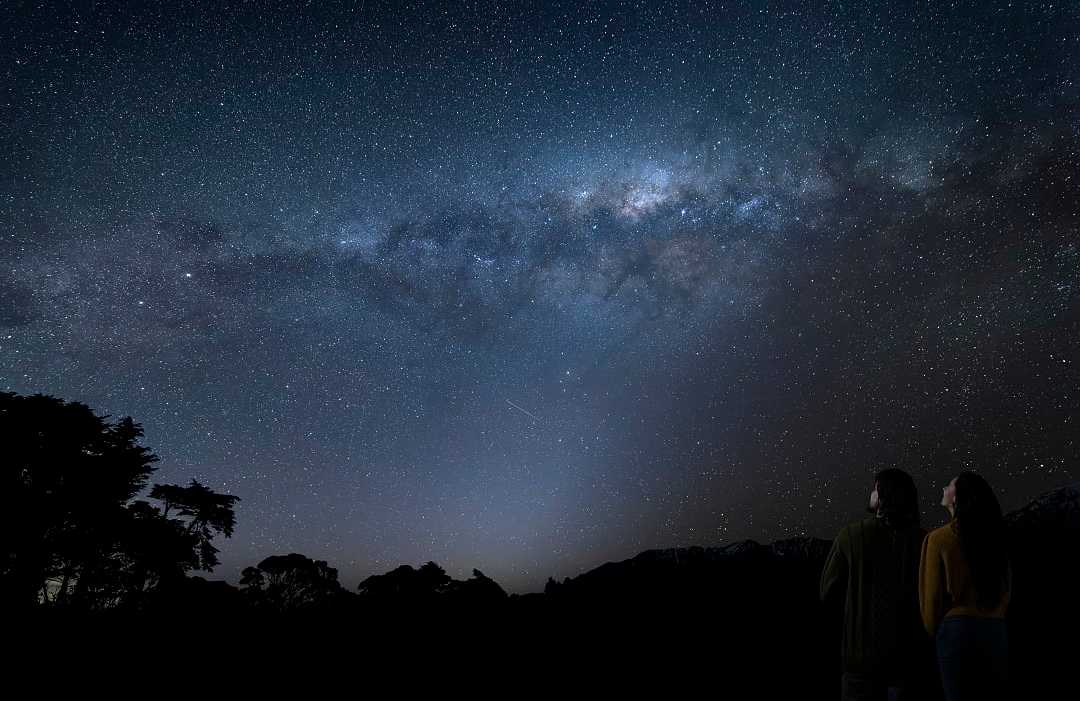 Dark Sky Reserve in New Zealand. Photo courtesy: Miles Holden / Tourism New Zealand Couple stargazing in New Zealand