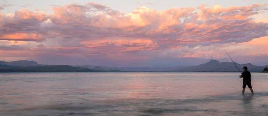 Fly fishing on Naheul Haupi Lake in Bariloche, Argentina
