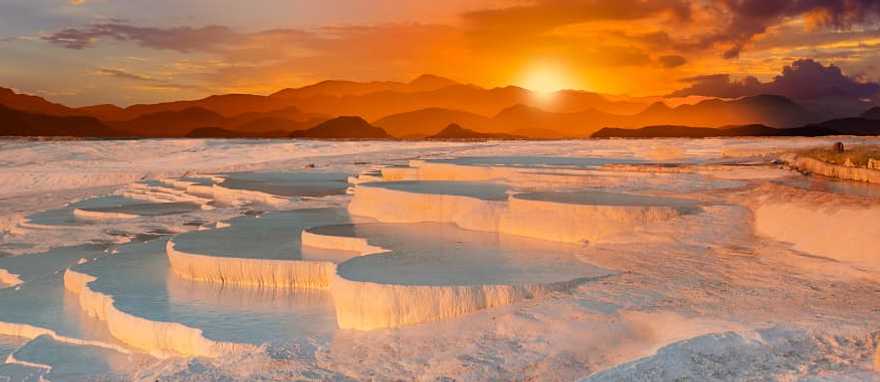 Beautiful sunrise at the Travertine pools and terraces in Turkey