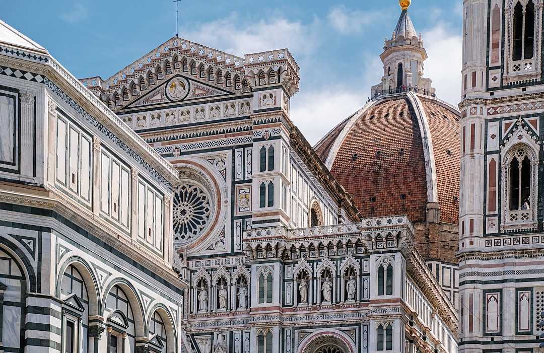 Architectural detail and the dome of Cathedral of Santa Maria del Fiore in Florence, Italy