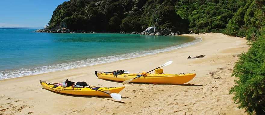 Abel Tasman National Park, New Zealand Kayaks on the beach in Abel Tasman National Park