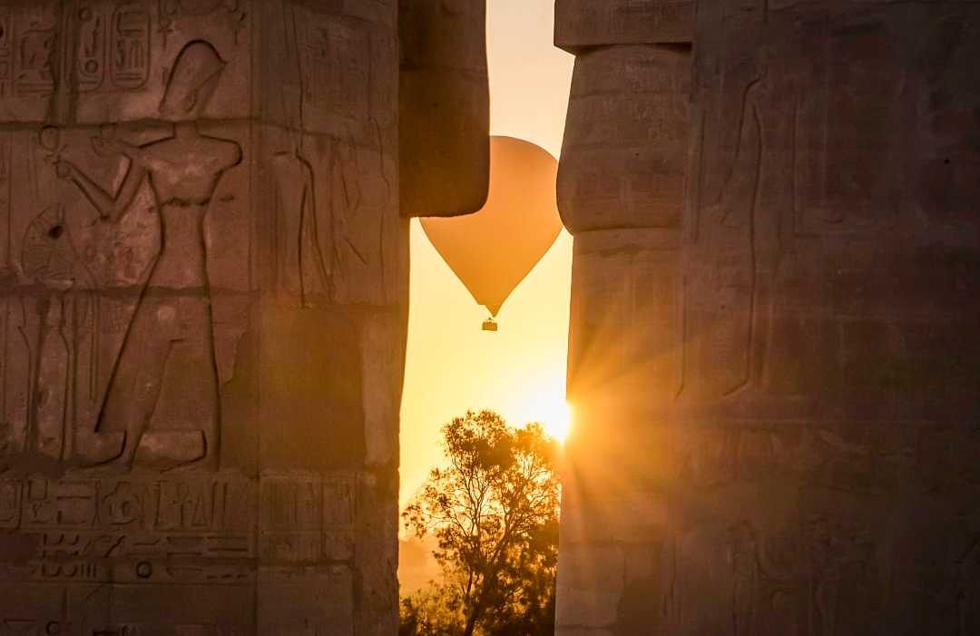 Ramesseum Temple in Luxor, Egypt Hot air balloon above the Ramesseum Temple is located on the West Bank of Luxor