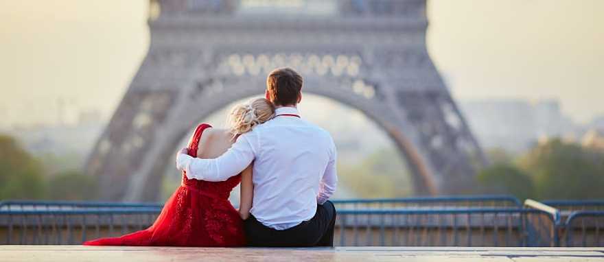 Couple overlooking the Eiffel Tower in Paris, France