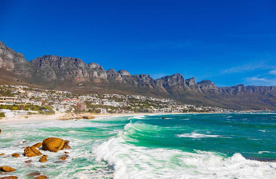 Camps Bay beach and Table Mountain in Cape Town, South Africa Camps Bay beach in Cape Town, South Africa