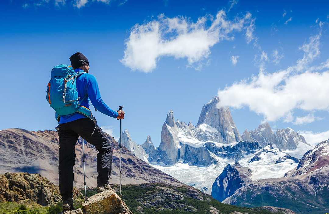 Hiker enjoying the view of Mount Fitz Roy, Patagonia