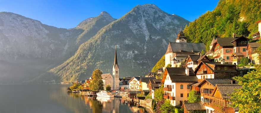 Wooden houses in Hallstatt village on an alpine lake in Salzkammergut, Austria Wooden houses in Hallstatt village on an alpine lake in Salzkammergut, Austria