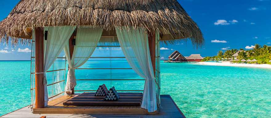 Bungalows over turquoise water in Bora Bora Bungalows over turquoise water in Bora Bora