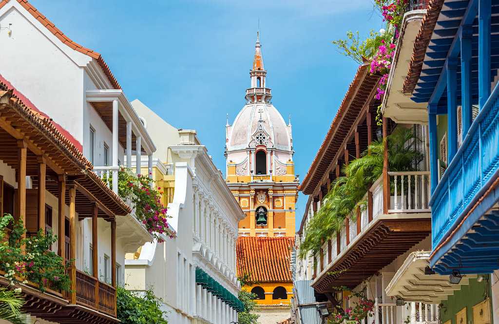Cartagena, Colombia Balconies with flowers leading to cathedral in Cartagena, Colombia