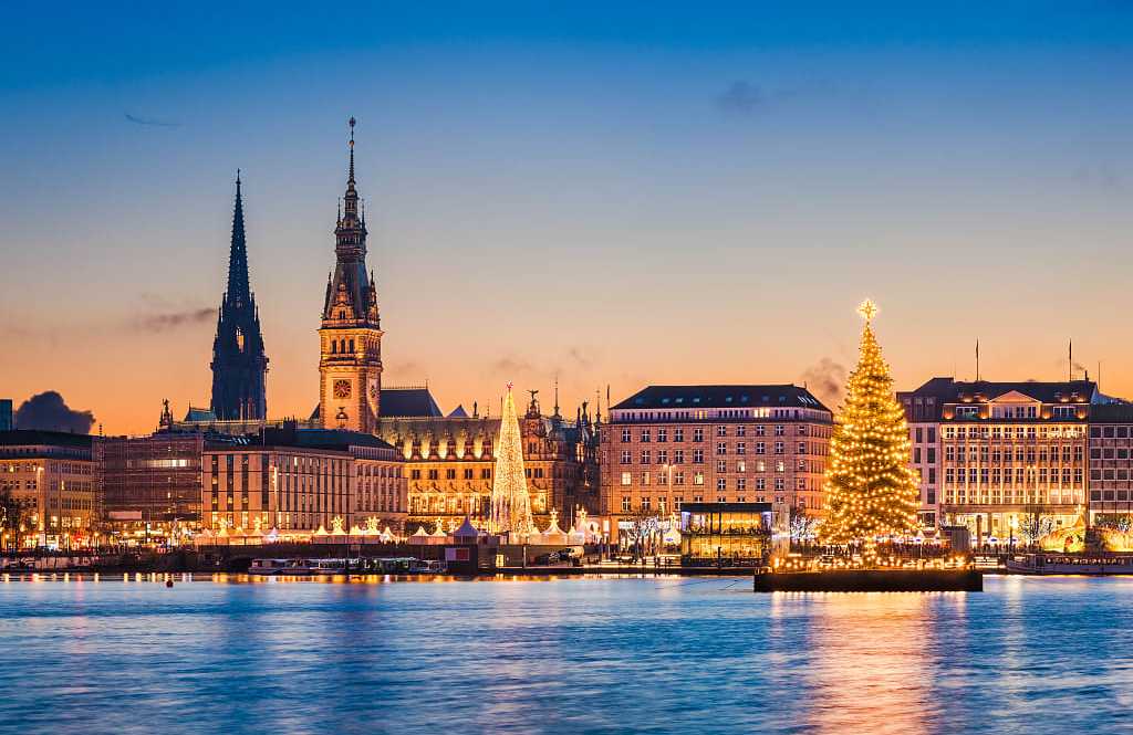Hamburg, Germany Hamburg skyline in winter with Christmas trees