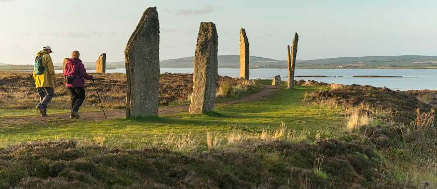 Senior couple hiking at the Ring of Brodger in Orkeny, Scotland