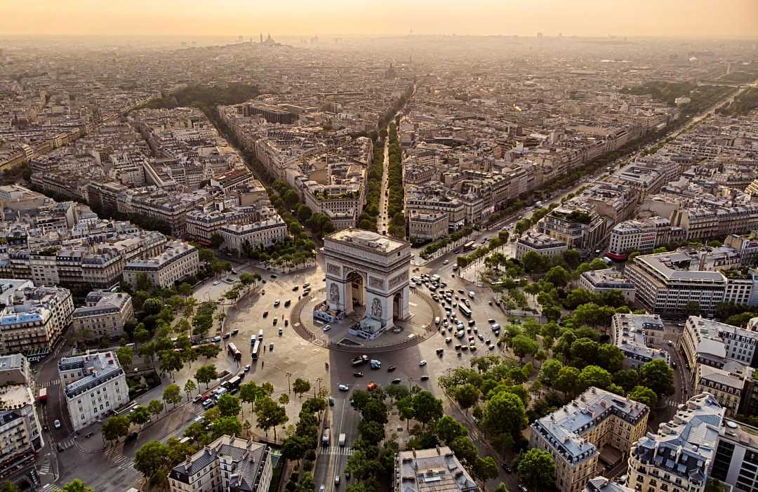Arc de Triomphe at sunrise in Paris, France